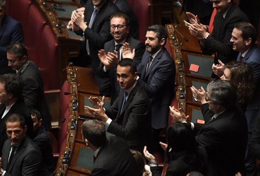 (180324) -- ROME, March 24, 2018 (Xinhua) -- Five Stars Movement members celebrate party member Roberto Fico being elected lower house speaker at the lower house of parliament in Rome, Italy, on March 24, 2018. Italy\