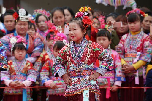 (180226) -- LIPING, Feb. 26, 2018 (Xinhua) -- A little girl of Miao ethnic group takes part in a folk event to pray for a good fortune in the New Year in Cengui Miao Village of Diping Township, Liping County, southwest China\