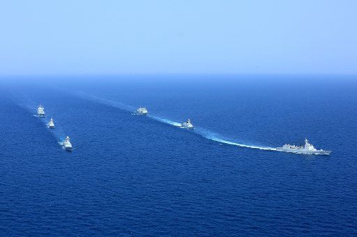 (180302) -- BEIJING, March 2, 2018 (Xinhua) -- Photo taken on Aug. 23, 2015 shows the 20th and 21st fleets for the escort mission of Gulf of Aden and waters off Somali sailing in the ocean. With China geared up for the annual meetings of its top legislative and political advisory bodies, the global spotlight is on Beijing searching for clues on how the world heavyweight will play on the international stage after the significant "Two Sessions." In a world beset with grave challenges in development, governance and security, leaders and observers worldwide say that guided by Chinese President Xi Jinping\