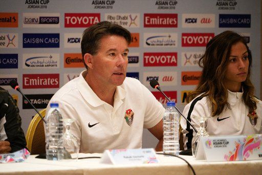 (180405) -- AMMAN, April 5, 2018 (Xinhua) -- Michael Dickey (L), head coach of Jordan attends the press conference before the match between Jordan and the Phillipines at the 2018 AFC Women\