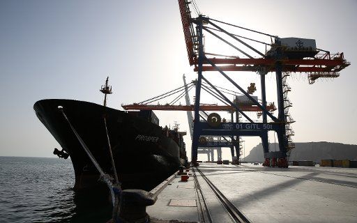 (180512) -- GWADAR, May 12, 2018 (Xinhua) -- Photo taken on March 28, 2018 shows a freighter docking in the Gwadar port of Pakistan. From a small, remote and less developed fishing village, Gwadar port now is embracing its new identity of Pakistan\