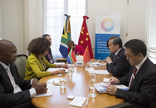 (180522) -- BUENOS AIRES, May 22, 2018 (Xinhua) -- Chinese State Councilor and Foreign Minister Wang Yi (2nd R) meets with South African Minister of International Relations and Cooperation Lindiwe Sisulu (2nd L) in Buenos Aires, Argentina, May 21, 2018, on the sidelines of the G20 foreign ministers\