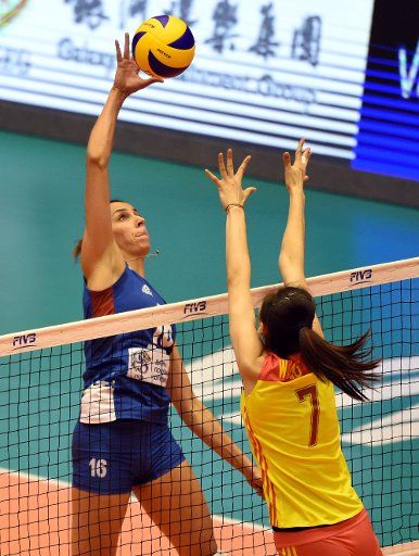 (180524) -- MACAO, May 24, 2018 (Xinhua) -- Milena Rasic (L) of Serbia spikes the ball during the FIVB Volleyball Nations League match between Serbia and China in Macao, south China, May 23, 2018. Serbia won 3-1. (Xinhua\/Lo Ping Fai)