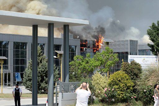 (180502) -- XANTHI, May 2, 2018 (Xinhua) -- Photo taken on May 1, 2018 shows a fire that broke out in Sunlight Systems, a factory that makes batteries, on the outskirts of the city of Xanthi, northeast of Athens, Greece. (Xinhua\/Laskaris Tsoutsas)