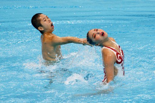 (180723) -- BUDAPEST, July 23, 2018 (xinhua) -- Jimma Iwasaki and Kana Miyauchi (R) of Japan perform during the mixed duet free final at the 16th FINA World Junior Artistic Swimming Championships in Budapest, Hungary on July 22, 2018. Jimma Iwasaki and Kana Miyauchi won the bronze medal with 80.7667 points. (Xinhua\/Szilard Voros)