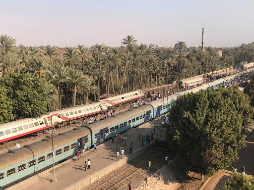 (180713) -- GIZA, July 13, 2018 (Xinhua) -- Photo taken with mobile phone shows the site where a train derails in Giza, Egypt, July 13, 2018. At least 55 people were injured as an Egyptian train derailed on Friday near Giza, south of the capital Cairo, official MENA news agency reported. (Xinhua\/Ahmed Gomaa) (zjl)