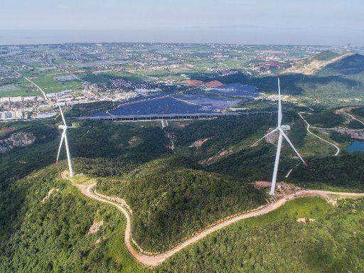 (180823) -- CHANGXING, Aug. 23, 2018 (Xinhua) -- Aerial photo taken on Aug. 23, 2018 shows the Bianshan wind farm in Changxing County, east China\