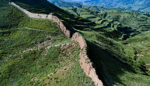 (180824) -- GUANGLING, Aug. 24, 2018 (Xinhua) -- Aerial photo taken on Aug. 24, 2018 shows the view of a section of ancient Great Wall on the outskirts of Guangling County, north China\