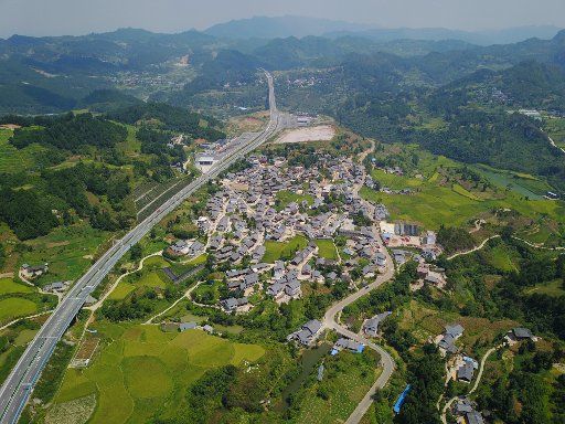 (180826) -- DANZHAI, Aug. 26, 2018 (Xinhua) -- Aerial photo taken on Aug. 26, 2018 shows the scenery of Baini Village of Xingren Township in Danzhai County, southwest China\