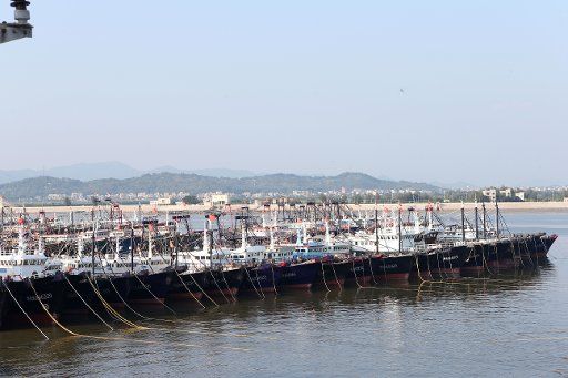 (180915) -- MAOMING, Sept. 15, 2018 (Xinhua) -- Photo taken on Sept.15, 2018 shows fishing boats harbor at a port in Maoming, south China\