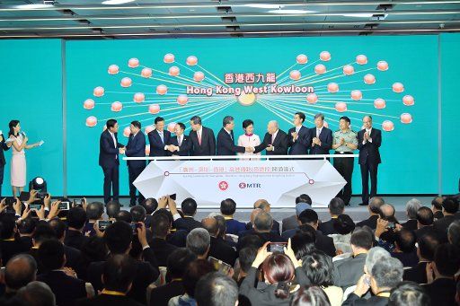 (180922) -- HONG KONG, Sept. 22, 2018 (Xinhua) -- The opening ceremony of the Hong Kong Section of the Guangzhou-Shenzhen-Hong Kong High Speed Rail is held at the West Kowloon Station in Hong Kong Special Administrative Region (HKSAR), south China, Sept. 22, 2018. HKSAR Chief Executive Lam Cheng Yuet-ngor (6th R) said at the opening ceremony that the opening of the Hong Kong section marked the region\