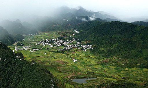 (180902) -- LONGLIN, Sept. 2, 2018 (Xinhua) -- Aerial photo taken on Sept. 1, 2018 shows the rural scenery in Kechang Township of Longlin Various Nationalities Autonomous County, south China\