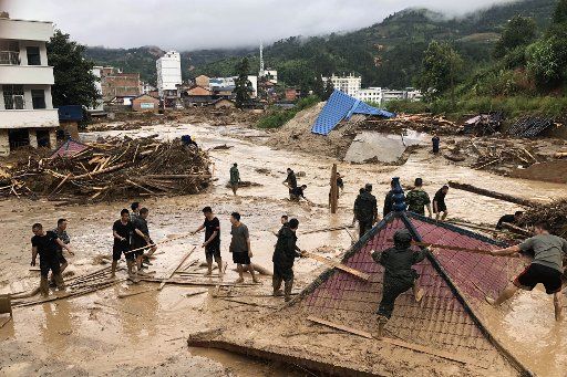 (180903) -- KUNMING, Sept. 3, 2018 (Xinhua) -- Rescuers work in flood in Mengdong Township in Malipo County of Zhuang and Miao Autonomous Prefecture of Wenshan, southwest China\