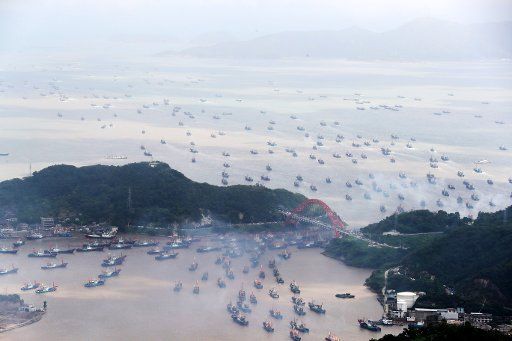 (180923) -- BEIJING, Sept. 23, 2018 (Xinhua) -- Fishing boats sail out of the Shipu fishing port in Xiangshan County of Ningbo City, east China\