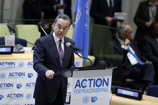 (180926) -- UNITED NATIONS, Sept. 26, 2018 (Xinhua) -- Chinese State Councilor and Foreign Minister Wang Yi attends the high-level meeting on Action for Peacekeeping in New York, on Sept. 25, 2018. (Xinhua\/Li Muzi) (rh)