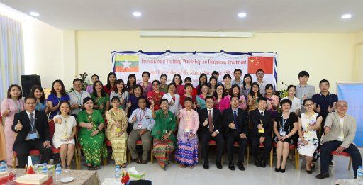 (181103) -- YANGON, Nov. 3, 2018 (Xinhua) -- Chinese representatives from Hainan Medical University, professors from Obstetrics and Gynecology Department of Myanmar Medical Universities and representatives of Central Women\