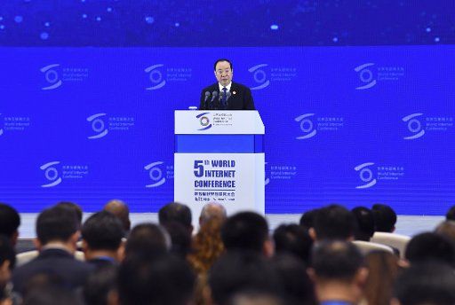 (181107) -- HANGZHOU, Nov. 7, 2018 (Xinhua) -- Huang Kunming, a member of the Political Bureau of the Communist Party of China (CPC) Central Committee and head of the Publicity Department of the CPC Central Committee, reads a congratulatory letter from Chinese President Xi Jinping to the fifth World Internet Conference (WIC) at the opening ceremony of the conference in Wuzhen Town, east China\