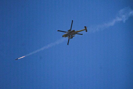(181113) -- SDEROT, Nov. 13, 2018 (Xinhua) -- An Israeli helicopter fires a missile over the Gaza Strip, on Nov. 13, 2018. Israel\