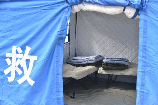 (181020) -- MENLING, Oct. 20, 2018 (Xinhua) -- Photo taken on Oct. 19, 2018 shows a tent set up at a temporary shelter at Niding Village in Menling County, southwest China\