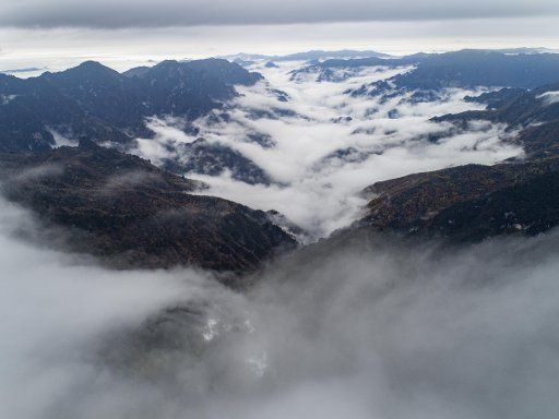 (181020) -- SHENNONGJIA, Oct. 20, 2018 (Xinhua) -- Aerial photo taken on Oct. 20, 2018 shows the cloud-covered Yinyu River Valley within the Shennongding Scenic Area in Shennongjia Forestry District, central China\
