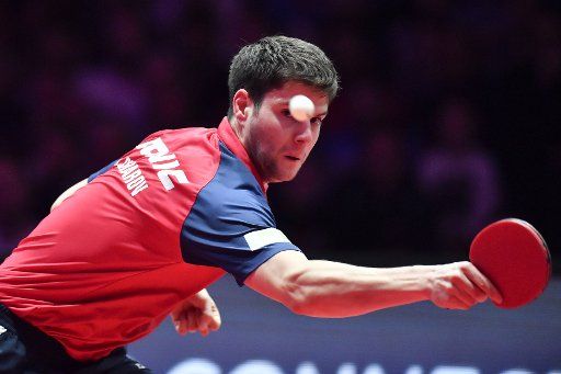 (181021) -- CHESSY, Oct. 21, 2018 (Xinhua) -- Dimitrij Ovtcharov of Germany hits a return during the semifinal match against Timo Boll of Germany at the 2018 ITTF Men\