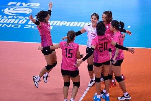 (181208) -- SHAOXING, Dec. 8, 2018 (Xinhua) -- Players of Supreme Chonburi celebrate during a Classification 5-8 match between Supreme Chonburi of Thailand and Volero Le Cannet of France at the FIVB Volleyball Women\