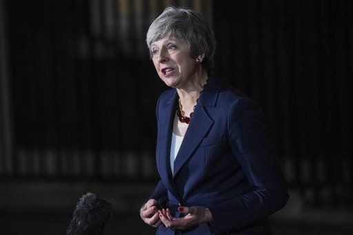 (181114) -- LONDON, Nov. 14, 2018 (Xinhua) -- British Prime Minister Theresa May delivers a Brexit statement outside 10 Downing Street in London, Britain, on Nov. 14, 2018. Theresa May announced Wednesday night that the cabinet has given its backing to her Brexit deal. (Xinhua\/Stephen Chung)