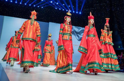 (181121) -- HOHHOT, Nov. 21, 2018 (Xinhua) -- Models present creations during the 15th Mongolian Costume Arts Festival in Hohhot, north China\