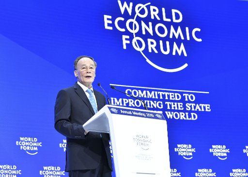 (190123) -- DAVOS, Jan. 23, 2019 (Xinhua) -- Chinese Vice President Wang Qishan addresses the 2019 annual meeting of the World Economic Forum in Davos, Switzerland, on Jan. 23, 2019. (Xinhua\/Yin Bogu)