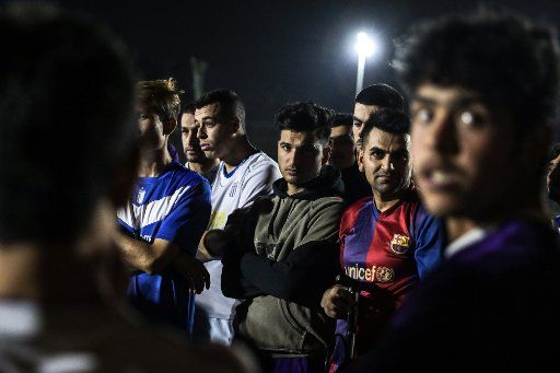 (190130) -- ATHENS, Jan. 30, 2019 (Xinhua) -- Members of the Greek Homeless Football Team are seen before they started their practice in a municipal stadium in the center of Athens, Greece, on Jan. 27, 2019. The team made its debut in 2007 and participates in the Homeless World Cup competitions every year. TO GO WITH Feature: Greek Homeless Football Team a step towards social inclusion (Xinhua\/Lefteris Partsalis)