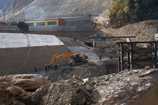 (190220) -- SINDHUPALCHOWK, Feb. 20, 2019 (Xinhua) -- Workers build a dry port in Tatopani of Sindhupalchwok District, Nepal, on Feb. 18, 2019. (Xinhua\/Sunil Sharma)