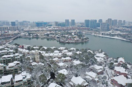 (190208) -- NANJING, Feb. 8, 2019 (Xinhua) -- Aerial photo taken on Feb. 8, 2019 shows the snow scenery around Baijia Lake in Nanjing, capital of east China\