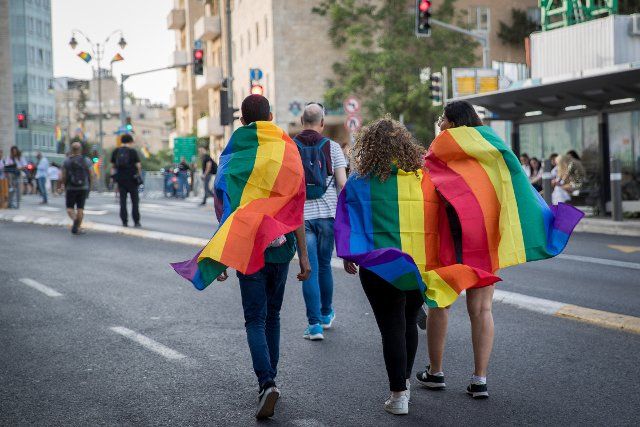 (190606) -- JERUSALEM, June 6, 2019 (Xinhua) -- People participate in the annual pride parade in Jerusalem, on June 6, 2019. Thousands of people marched to call for equality, security and freedom for the LGBT community at the 18th Jerusalem pride parade on Thursday. This year\