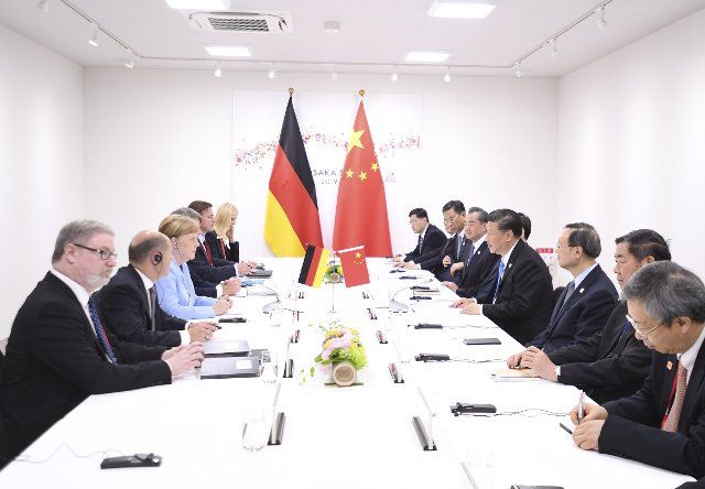 (190628) -- OSAKA, June 28, 2019 (Xinhua) -- Chinese President Xi Jinping meets with German Chancellor Angela Merkel in Osaka, Japan, June 28, 2019. (Xinhua\/Yan Yan)