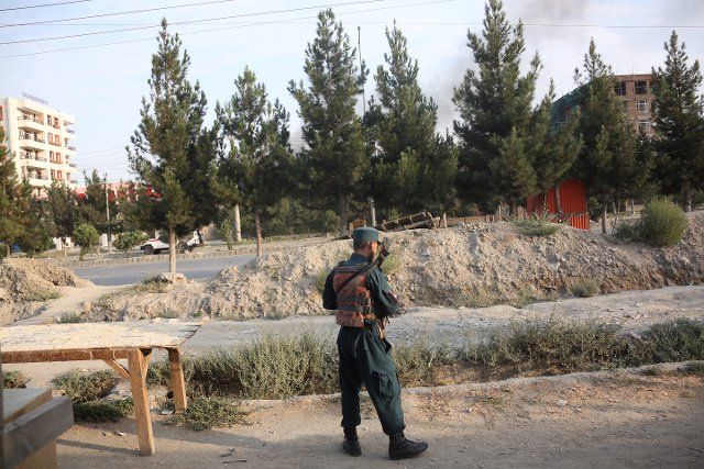 (190728) -- KABUL, July 28, 2019 (Xinhua) -- A member of Afghan security force stands guard at the site of a blast in Kabul, capital of Afghanistan, July 28, 2019. At least one person was confirmed dead and 13 others were injured as a blast rocked Afghanistan\