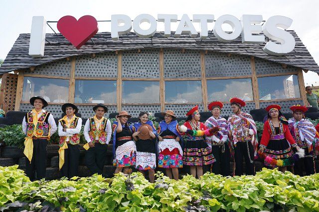 (190901) -- BEIJING, Sept. 1, 2019 (Xinhua) -- Artists prepare to perform during the "International Potato Center and Peru Joint Honorary Day" theme event held as part of the Beijing International Horticultural Exhibition in Yanqing District in Beijing, capital of China, Sept. 1, 2019. (Xinhua\/Ju Huanzong)