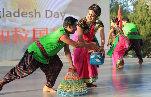 (190925) -- BEIJING, Sept. 25, 2019 (Xinhua) -- Artists perform during the "Bangladesh Day" event of the Beijing International Horticultural Exhibition in Beijing, capital of China, Sept. 25, 2019. The expo held its "Bangladesh Day" event on Wednesday. (Photo by Duan Xuefeng\/Xinhua