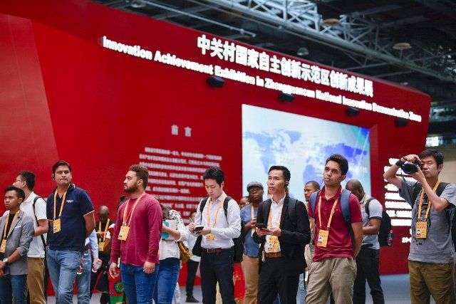 (190926) -- BEIJING, Sept. 26, 2019 (Xinhua) -- Journalists visit the Innovation Achievement Exhibition in Zhongguancun National Innovative Demonstration Zone in Beijing, capital of China, Sept. 26, 2019. More than 60 journalists from 36 countries and regions on Thursday visited the exhibition. (Xinhua\/Liu Chan
