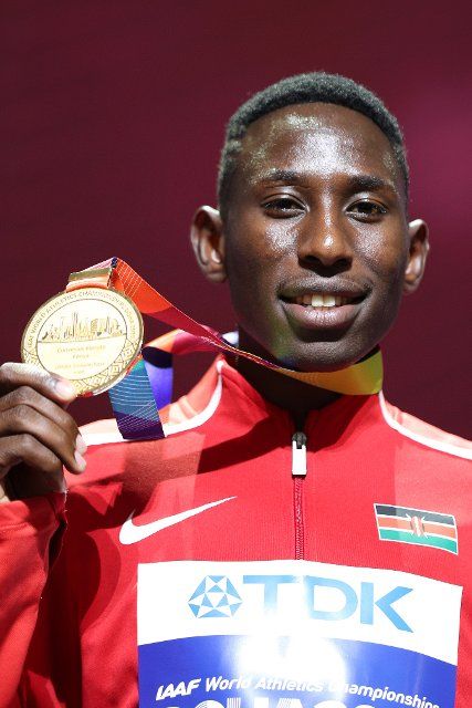(191005) -- DOHA, Oct. 5, 2019 (Xinhua) -- Gold medalist Conseslus Kipruto of Kenya poses with his medal during the medal ceremony of the men\