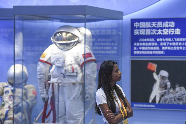 (190930) -- BEIJING, Sept. 30, 2019 (Xinhua) -- A foreign journalist visits an exhibition of achievements marking the 70th anniversary of the founding of the People\
