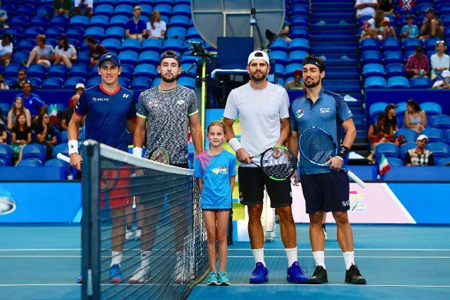 (200105) -- PERTH, Jan. 5, 2020 (Xinhua) -- Simone Bolelli (2nd R) and Fabio Fognini (1st R) of Italy, Viktor Durasovic (2nd L) and Casper Ruud (1st L) of Norway pose for group photos before their ATP Cup tennis group D match in Perth, Australia, on Jan. 5, 2020. (Photo by Zhou Dan\/Xinhua)