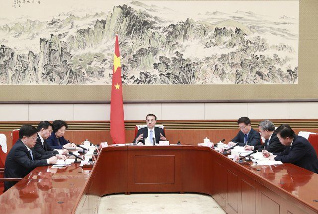 (200114) -- BEIJING, Jan. 14, 2020 (Xinhua) -- Chinese Premier Li Keqiang presides over a plenary meeting of the State Council in Beijing, capital of China, Jan. 13, 2020. (Xinhua\/Pang Xinglei