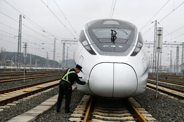 (200117) -- GUIYANG, Jan. 17, 2020 (Xinhua) -- A mechanic engineer checks the red-eye train G4922 in Guiyang, southwest China\