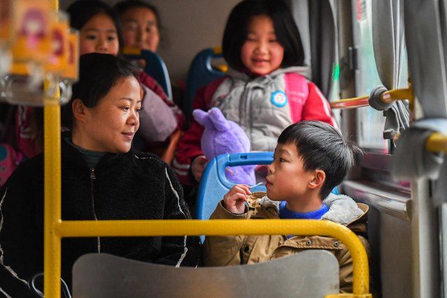 (200111) -- CHANGSHA, Jan. 11, 2020 (Xinhua) -- Xiang Mei collects her son from school at Jishou City of Xiangxi Tujia and Miao Autonomous Prefecture, central China\
