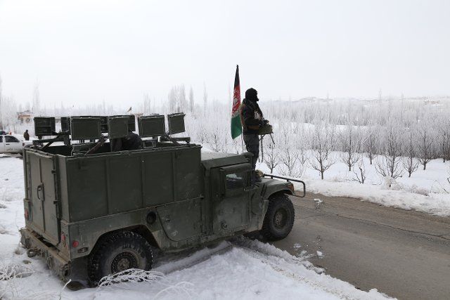 (200129) -- GHAZNI, Jan. 29, 2020 (Xinhua) -- An Afghan security force member stands on a military vehicle during a military operation in Khuja Omari district of Ghazni province, eastern Afghanistan, Jan. 29, 2020. Ghazni province, 125 km south of the country\