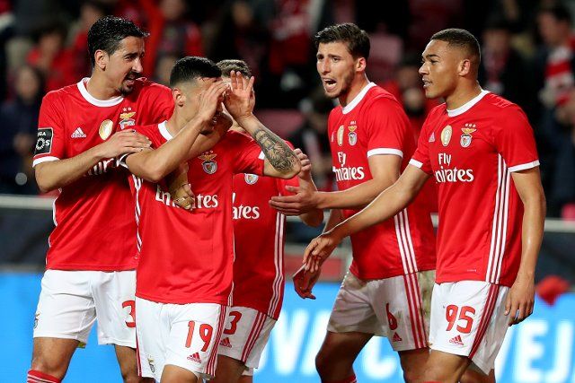 (200201) -- LISBON, Feb. 1, 2020 (Xinhua) -- Chiquinho (2nd L) of SL Benfica celebrates with teammates after scoring during the Portuguese League football match between SL Benfica and Belenenses SAD in Lisbon, Portugal on Jan. 31, 2020. (Photo by Pedro Fiuza\/Xinhua)