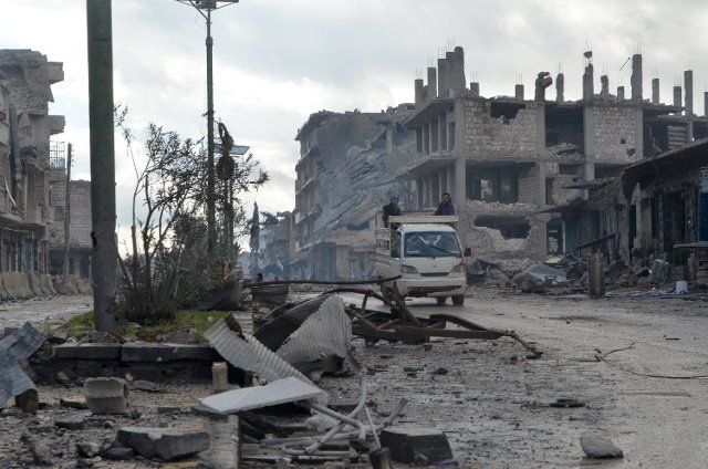 (200201) -- MAARAT AL-NUMAN, Feb. 1, 2020 (Xinhua) -- Debris are seen in the Maarat al-Numan city, Idlib Province, Syria, on Jan. 30, 2020. TO GO WITH: "Feature: War in Syria turns city to ghost town" (Photo by Maher\/Xinhua)
