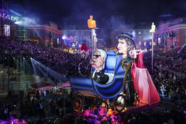 (200216) -- NICE (FRANCE), Feb. 16, 2020 (Xinhua) -- A float is paraded through the crowd during the Nice Carnival parade in Nice, France, on Feb. 15, 2020. The 136th Nice Carnival is held here from Feb. 15 to Feb. 29 on the theme "King of Fashion." (Photo by Serge Haouzi\/Xinhua)