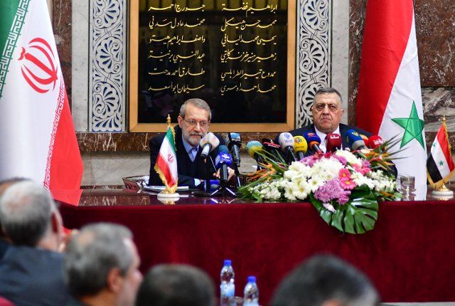 (200217) -- DAMASCUS, Feb. 17, 2020 (Xinhua) -- Visiting Iranian Parliament Speaker Ali Larijani (L) holds a press conference with his Syrian counterpart Hammoudeh Sabbagh in Damascus, Syria, following their meeting in the Syrian Parliament, Feb. 16, 2020. Visiting Iranian Parliament Speaker Ali Larijani said on Sunday that his country is expecting major economic cooperation with Syria in the future. (Photo by Ammar Safarjalani\/Xinhua)