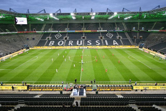 (200312) -- MONCHENGLADBACH, March 12, 2020 (Xinhua) -- Photo taken on March 11, 2020 shows the general view inside the stadium with empty seats during a German Bundesliga match between Borussia Monchengladbach and FC Cologne in Monchengladbach, Germany. Due to the COVID-19 outbreak, the match was held behind closed doors for the first time in Bundesliga history, accoring to German media. (Photo by Ulrich Hufnagel\/Xinhua)